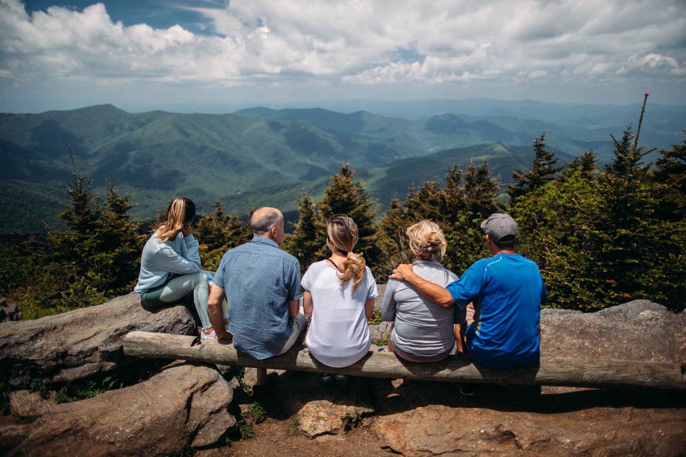 Family looking out over mountain valley